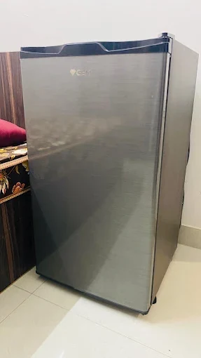 Mini refrigerator in room